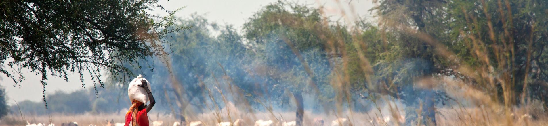 Woman walking south sudan