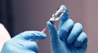 healthcare professional administering a vaccine