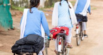 Girls in India on bicycles