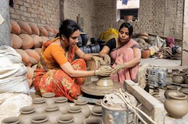 Women working on pots