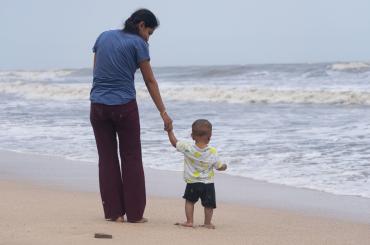 mother and child, depicting child-rearing